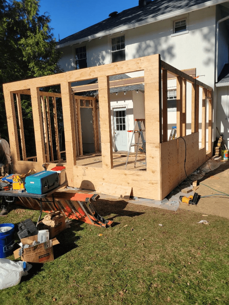 photo of exterior of sunroom being built