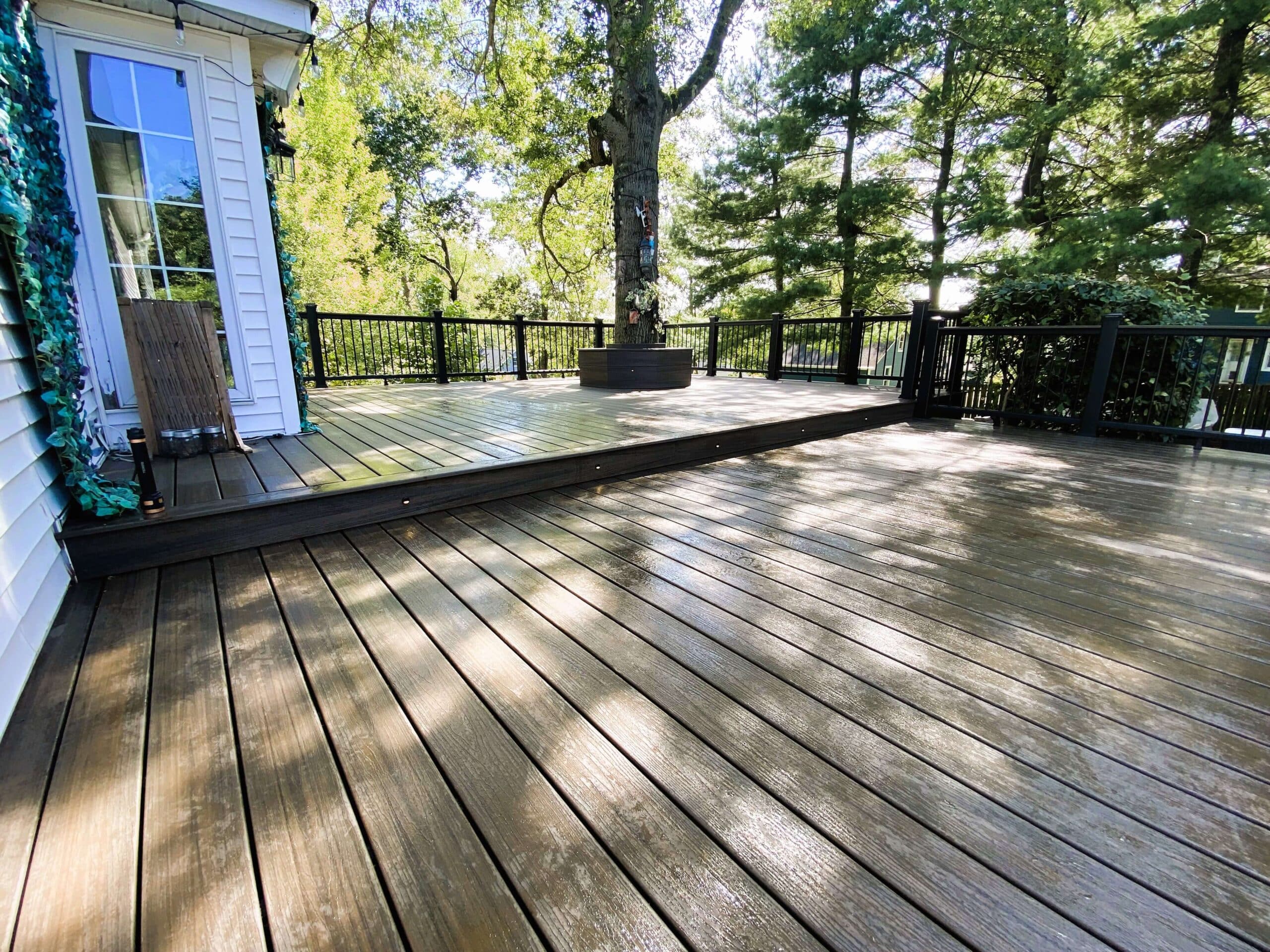 photo of new deck with a bench built around a tree