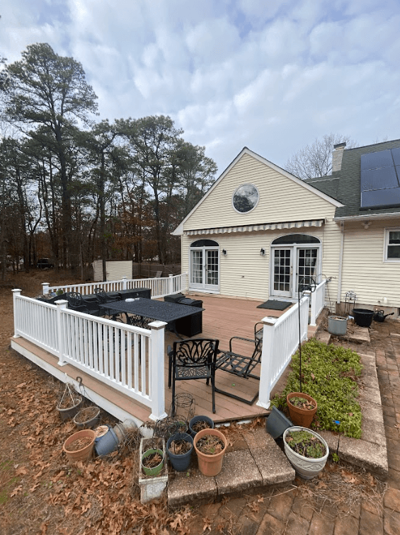 Aging deck attached to back of house that will be replaced in Bayville, NJ